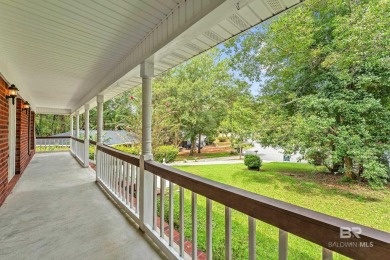 CHARMING three-bedroom, two-bath brick home situated in a quiet on Lake Forest Yacht and Country Club in Alabama - for sale on GolfHomes.com, golf home, golf lot