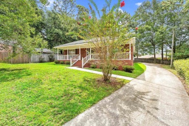 CHARMING three-bedroom, two-bath brick home situated in a quiet on Lake Forest Yacht and Country Club in Alabama - for sale on GolfHomes.com, golf home, golf lot