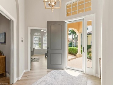 Spectacular lake & golf course view!  This renovated home in on  in Florida - for sale on GolfHomes.com, golf home, golf lot