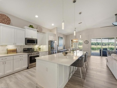 Spectacular lake & golf course view!  This renovated home in on  in Florida - for sale on GolfHomes.com, golf home, golf lot