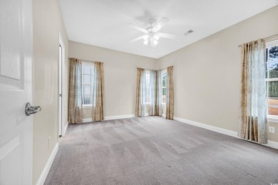 Located on a cul-de-sac in The Commons, this 3-bedroom on Burning Ridge Golf Course in South Carolina - for sale on GolfHomes.com, golf home, golf lot