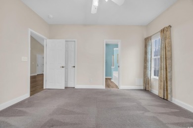 Located on a cul-de-sac in The Commons, this 3-bedroom on Burning Ridge Golf Course in South Carolina - for sale on GolfHomes.com, golf home, golf lot