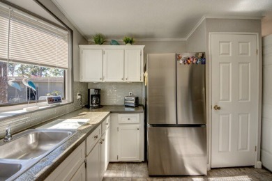 If you're looking for a home with a breathtaking view, this is on Pine Lakes Country Club in Florida - for sale on GolfHomes.com, golf home, golf lot