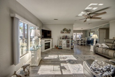 If you're looking for a home with a breathtaking view, this is on Pine Lakes Country Club in Florida - for sale on GolfHomes.com, golf home, golf lot