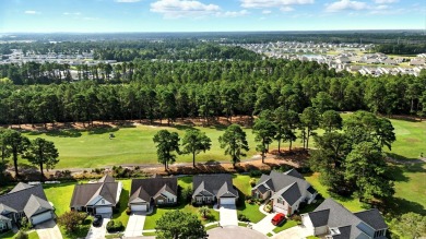 Located on a cul-de-sac in The Commons, this 3-bedroom on Burning Ridge Golf Course in South Carolina - for sale on GolfHomes.com, golf home, golf lot