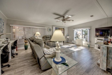 If you're looking for a home with a breathtaking view, this is on Pine Lakes Country Club in Florida - for sale on GolfHomes.com, golf home, golf lot