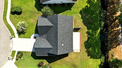 Located on a cul-de-sac in The Commons, this 3-bedroom on Burning Ridge Golf Course in South Carolina - for sale on GolfHomes.com, golf home, golf lot