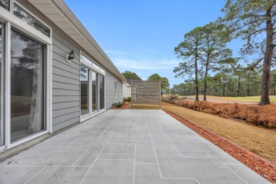 Located on a cul-de-sac in The Commons, this 3-bedroom on Burning Ridge Golf Course in South Carolina - for sale on GolfHomes.com, golf home, golf lot