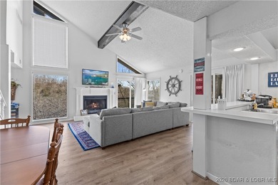 Located in the iconic Tan Tar A Estates, adjacent to on The Oaks Golf Course in Missouri - for sale on GolfHomes.com, golf home, golf lot