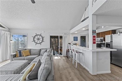 Located in the iconic Tan Tar A Estates, adjacent to on The Oaks Golf Course in Missouri - for sale on GolfHomes.com, golf home, golf lot