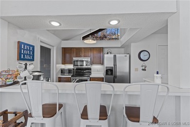 Located in the iconic Tan Tar A Estates, adjacent to on The Oaks Golf Course in Missouri - for sale on GolfHomes.com, golf home, golf lot