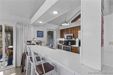 Located in the iconic Tan Tar A Estates, adjacent to on The Oaks Golf Course in Missouri - for sale on GolfHomes.com, golf home, golf lot