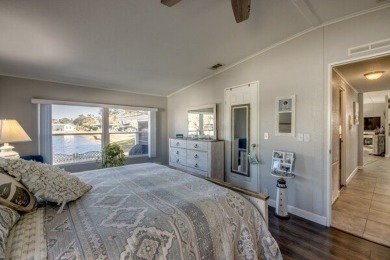 If you're looking for a home with a breathtaking view, this is on Pine Lakes Country Club in Florida - for sale on GolfHomes.com, golf home, golf lot