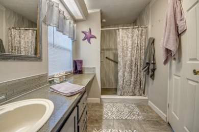If you're looking for a home with a breathtaking view, this is on Pine Lakes Country Club in Florida - for sale on GolfHomes.com, golf home, golf lot