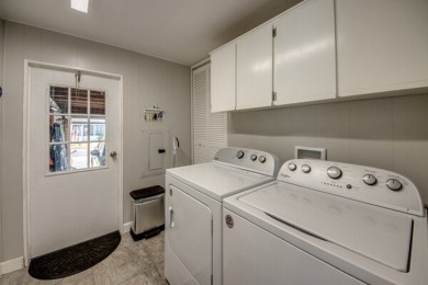 If you're looking for a home with a breathtaking view, this is on Pine Lakes Country Club in Florida - for sale on GolfHomes.com, golf home, golf lot