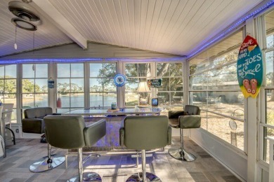 If you're looking for a home with a breathtaking view, this is on Pine Lakes Country Club in Florida - for sale on GolfHomes.com, golf home, golf lot