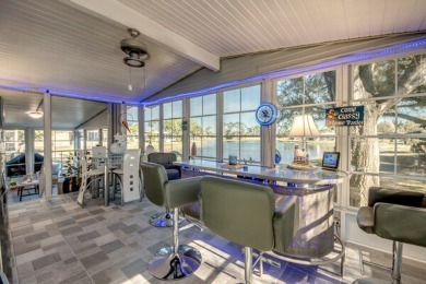 If you're looking for a home with a breathtaking view, this is on Pine Lakes Country Club in Florida - for sale on GolfHomes.com, golf home, golf lot