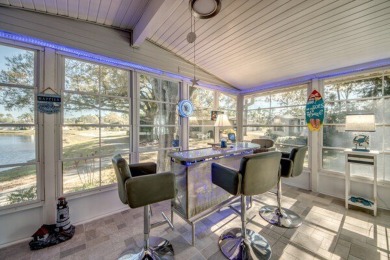 If you're looking for a home with a breathtaking view, this is on Pine Lakes Country Club in Florida - for sale on GolfHomes.com, golf home, golf lot