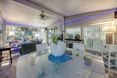 If you're looking for a home with a breathtaking view, this is on Pine Lakes Country Club in Florida - for sale on GolfHomes.com, golf home, golf lot