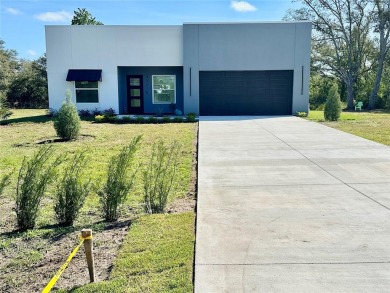 This STUNNING new construction CUSTOM BUILT STEEL MODERN home on Wedgefield Golf Club in Florida - for sale on GolfHomes.com, golf home, golf lot