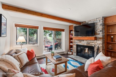 This desirable Country Club Townhome is located adjacent to the on The Snowmass Club in Colorado - for sale on GolfHomes.com, golf home, golf lot