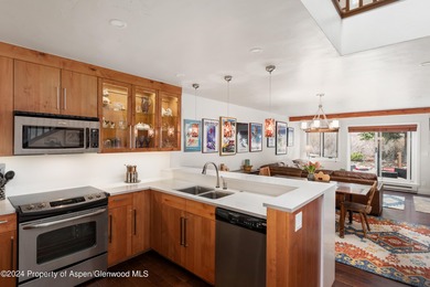 This desirable Country Club Townhome is located adjacent to the on The Snowmass Club in Colorado - for sale on GolfHomes.com, golf home, golf lot