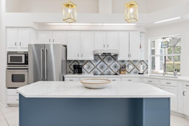 Welcome to this beautifully updated home in the gated golf on Emerald Bay Golf Club in Florida - for sale on GolfHomes.com, golf home, golf lot
