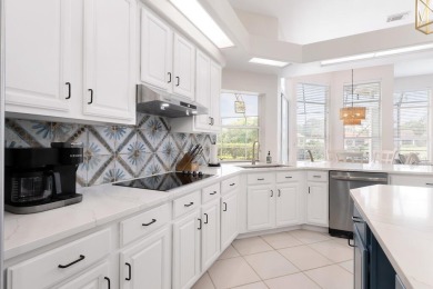 Welcome to this beautifully updated home in the gated golf on Emerald Bay Golf Club in Florida - for sale on GolfHomes.com, golf home, golf lot