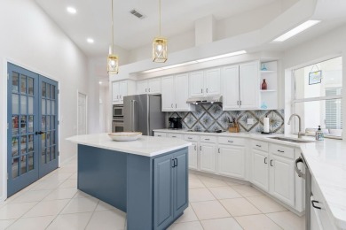 Welcome to this beautifully updated home in the gated golf on Emerald Bay Golf Club in Florida - for sale on GolfHomes.com, golf home, golf lot