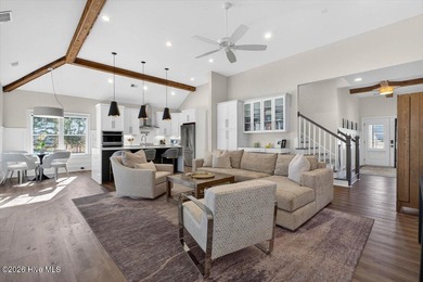 Step inside this luxury modern coastal craftsman home, perfectly on Sea Trail Golf Resort in North Carolina - for sale on GolfHomes.com, golf home, golf lot