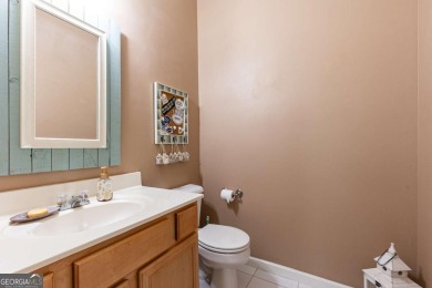 Welcome to this beautifully maintained three-level end-unit on Sugar Hill Golf Club in Georgia - for sale on GolfHomes.com, golf home, golf lot