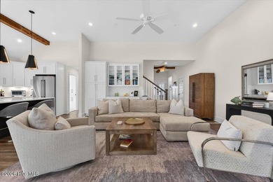 Step inside this luxury modern coastal craftsman home, perfectly on Sea Trail Golf Resort in North Carolina - for sale on GolfHomes.com, golf home, golf lot