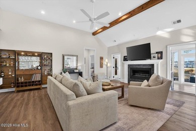 Step inside this luxury modern coastal craftsman home, perfectly on Sea Trail Golf Resort in North Carolina - for sale on GolfHomes.com, golf home, golf lot