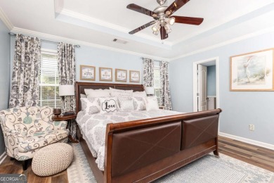 Welcome to this beautifully maintained three-level end-unit on Sugar Hill Golf Club in Georgia - for sale on GolfHomes.com, golf home, golf lot