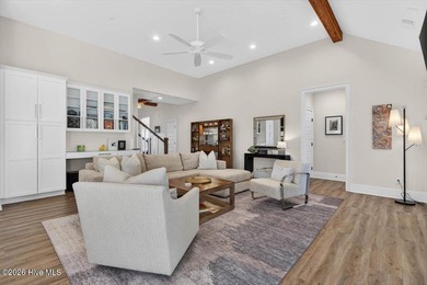 Step inside this luxury modern coastal craftsman home, perfectly on Sea Trail Golf Resort in North Carolina - for sale on GolfHomes.com, golf home, golf lot