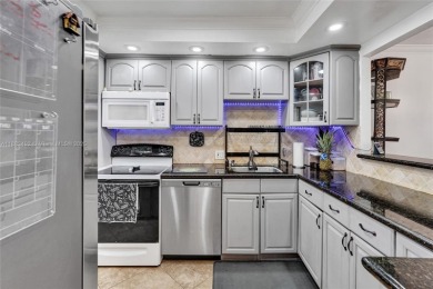 Remodeled 3/2 corner unit, the largest model in the building on  in Florida - for sale on GolfHomes.com, golf home, golf lot
