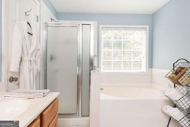 Welcome to this beautifully maintained three-level end-unit on Sugar Hill Golf Club in Georgia - for sale on GolfHomes.com, golf home, golf lot