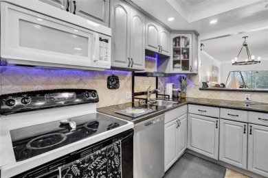 Remodeled 3/2 corner unit, the largest model in the building on  in Florida - for sale on GolfHomes.com, golf home, golf lot