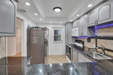 Remodeled 3/2 corner unit, the largest model in the building on  in Florida - for sale on GolfHomes.com, golf home, golf lot