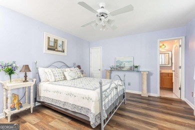 Welcome to this beautifully maintained three-level end-unit on Sugar Hill Golf Club in Georgia - for sale on GolfHomes.com, golf home, golf lot