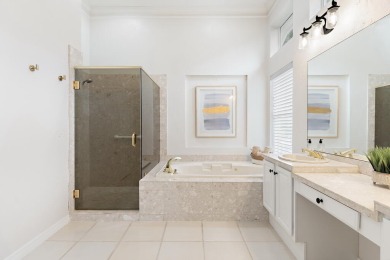 Welcome to this beautifully updated home in the gated golf on Emerald Bay Golf Club in Florida - for sale on GolfHomes.com, golf home, golf lot