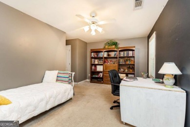 Welcome to this beautifully maintained three-level end-unit on Sugar Hill Golf Club in Georgia - for sale on GolfHomes.com, golf home, golf lot