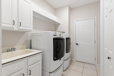 Welcome to this beautifully updated home in the gated golf on Emerald Bay Golf Club in Florida - for sale on GolfHomes.com, golf home, golf lot