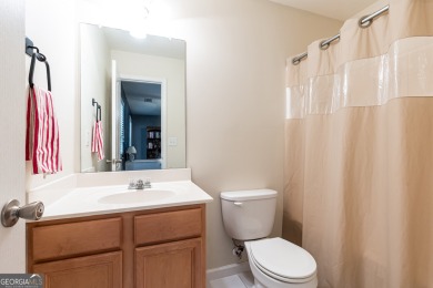Welcome to this beautifully maintained three-level end-unit on Sugar Hill Golf Club in Georgia - for sale on GolfHomes.com, golf home, golf lot
