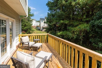 Welcome to this beautifully maintained three-level end-unit on Sugar Hill Golf Club in Georgia - for sale on GolfHomes.com, golf home, golf lot