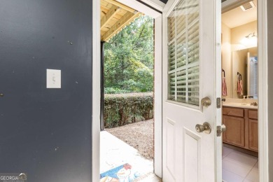 Welcome to this beautifully maintained three-level end-unit on Sugar Hill Golf Club in Georgia - for sale on GolfHomes.com, golf home, golf lot