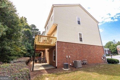 Welcome to this beautifully maintained three-level end-unit on Sugar Hill Golf Club in Georgia - for sale on GolfHomes.com, golf home, golf lot
