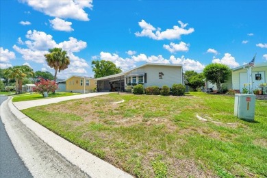 Welcome to this beautifully remodeled 2-bedroom, 2-bathroom home on Orange Blossom Hills Golf and Country Club in Florida - for sale on GolfHomes.com, golf home, golf lot