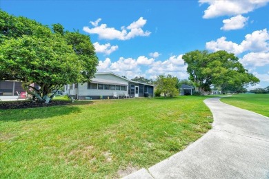 Welcome to this beautifully remodeled 2-bedroom, 2-bathroom home on Orange Blossom Hills Golf and Country Club in Florida - for sale on GolfHomes.com, golf home, golf lot