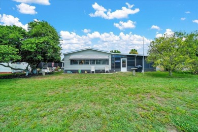 Welcome to this beautifully remodeled 2-bedroom, 2-bathroom home on Orange Blossom Hills Golf and Country Club in Florida - for sale on GolfHomes.com, golf home, golf lot